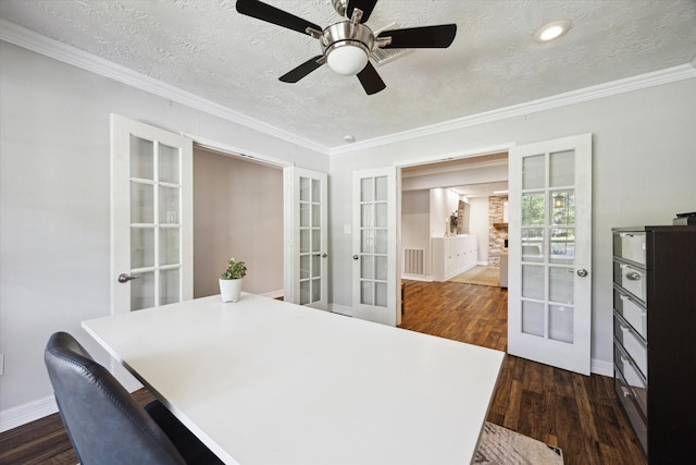 11102 Hillcroft St, Houston, TX 77096 - office space featuring french doors, dark wood-style flooring, ornamental molding, baseboards, and a textured ceiling
