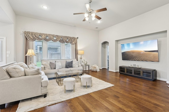 3403 Majestic Pine Ln, Rosenberg, TX 77471 - living area with arched walkways, a ceiling fan, wood finished floors, recessed lighting, and baseboards