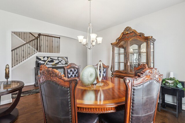 3403 Majestic Pine Ln, Rosenberg, TX 77471 - dining room with a chandelier, stairway, and dark wood-type flooring