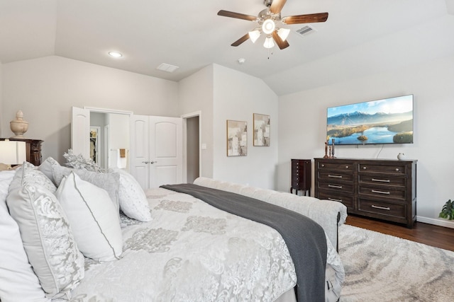 3403 Majestic Pine Ln, Rosenberg, TX 77471 - bedroom featuring lofted ceiling, dark wood finished floors, ceiling fan, and baseboards
