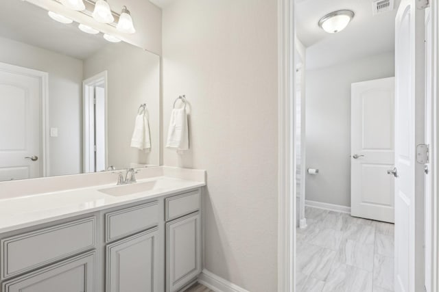 3403 Majestic Pine Ln, Rosenberg, TX 77471 - bathroom featuring marble finish flooring, vanity, and baseboards