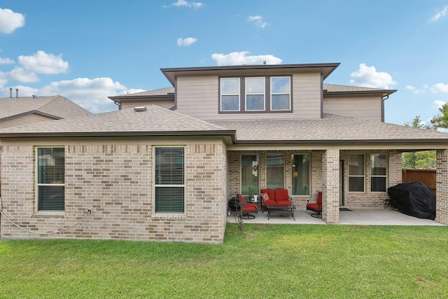 3403 Majestic Pine Ln, Rosenberg, TX 77471 - rear view of property with a patio, a yard, brick siding, and a shingled roof
