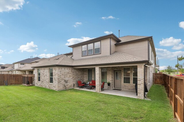3403 Majestic Pine Ln, Rosenberg, TX 77471 - back of house with brick siding, a patio area, and roof with shingles