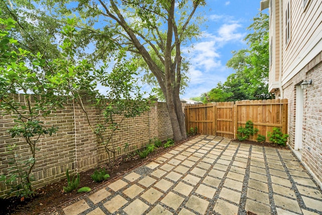 3001 Murworth Dr Unit 103, Houston, TX 77025 - fenced backyard with a patio area