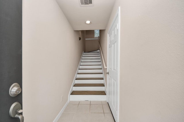 3001 Murworth Dr Unit 103, Houston, TX 77025 - staircase featuring tile patterned flooring, baseboards, and recessed lighting