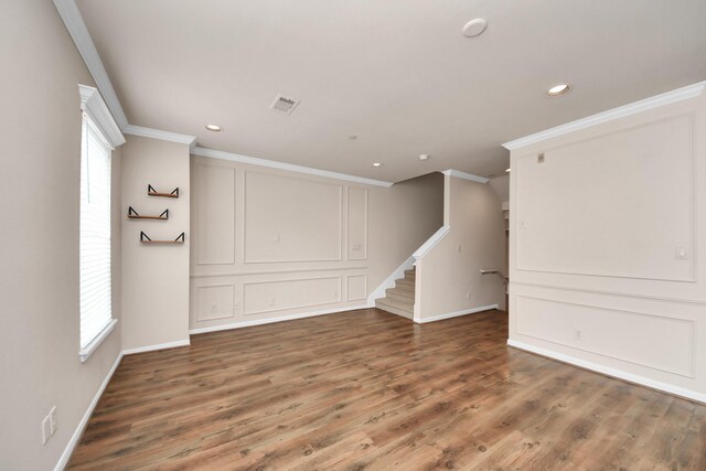3001 Murworth Dr Unit 103, Houston, TX 77025 - spare room featuring ornamental molding, wood finished floors, healthy amount of natural light, stairs, and baseboards