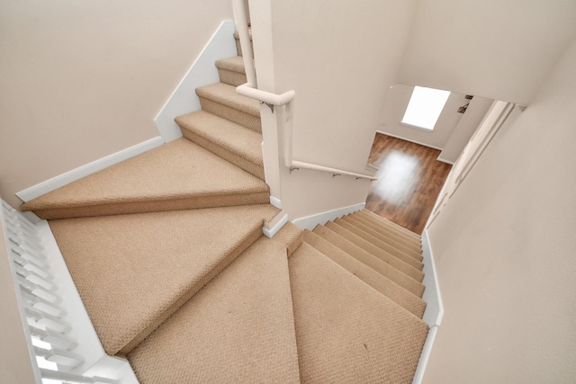 3001 Murworth Dr Unit 103, Houston, TX 77025 - staircase featuring baseboards and carpet
