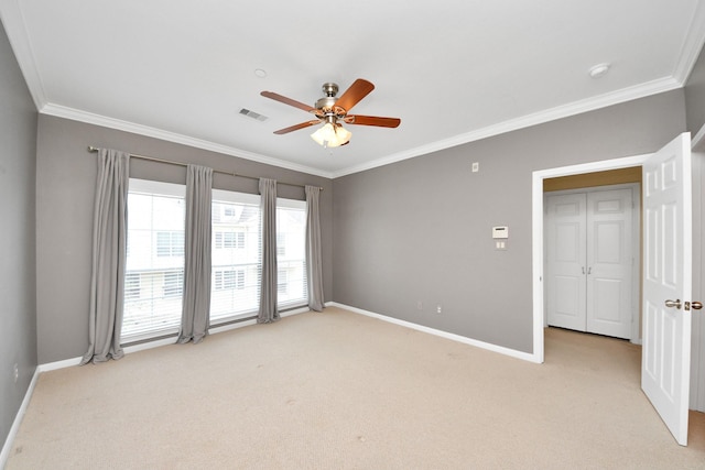 3001 Murworth Dr Unit 103, Houston, TX 77025 - spare room featuring light carpet, crown molding, baseboards, a ceiling fan, and a smoke detector