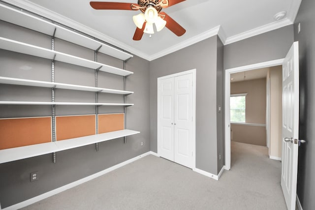 3001 Murworth Dr Unit 103, Houston, TX 77025 - unfurnished bedroom with crown molding, carpet flooring, baseboards, a closet, and ceiling fan