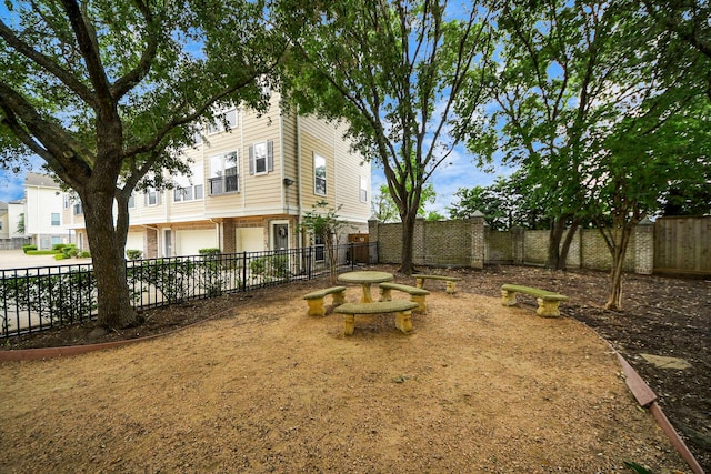 3001 Murworth Dr Unit 103, Houston, TX 77025 - fenced backyard with an attached garage