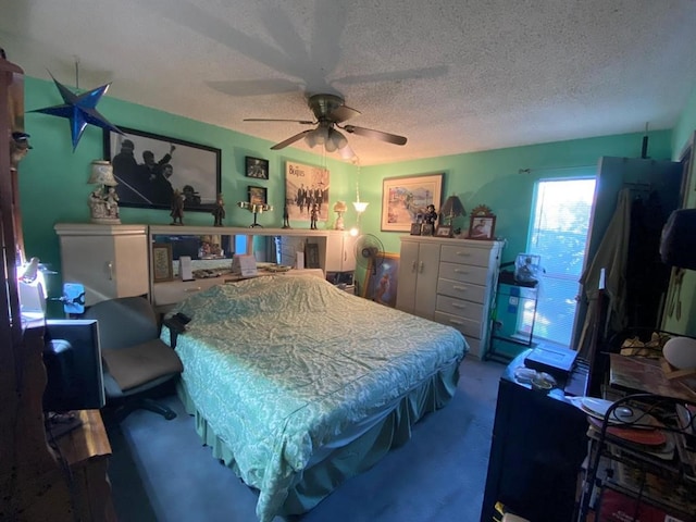 10049 Westpark Dr Unit 136, Houston, TX 77042 - bedroom with a textured ceiling, billiards table, and a ceiling fan