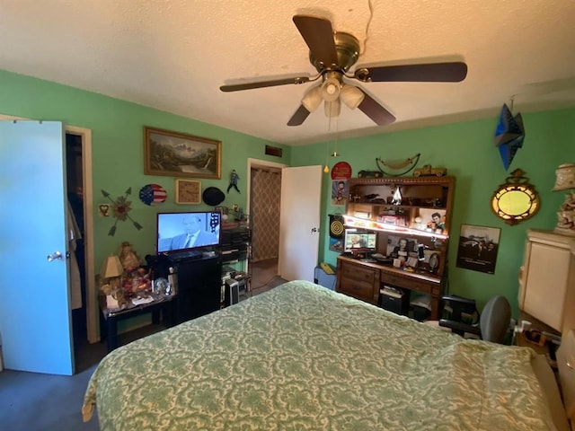 10049 Westpark Dr Unit 136, Houston, TX 77042 - bedroom featuring ceiling fan