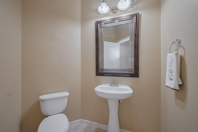4515 Tremont Glen Ln, Katy, TX 77494 - half bathroom featuring toilet and tile patterned flooring