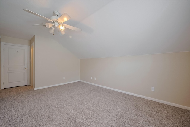 4515 Tremont Glen Ln, Katy, TX 77494 - additional living space with vaulted ceiling, light colored carpet, a ceiling fan, and baseboards
