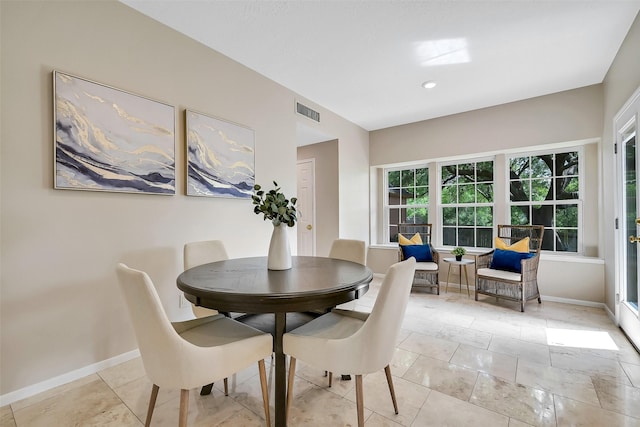 1805 Twin Oaks St, Friendswood, TX 77546 - dining room featuring baseboards