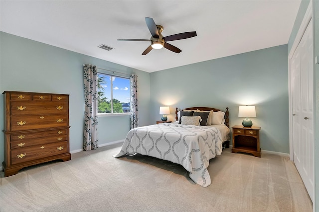 1805 Twin Oaks St, Friendswood, TX 77546 - bedroom with a closet, baseboards, and light carpet