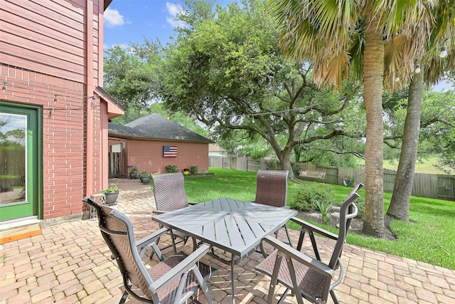 1805 Twin Oaks St, Friendswood, TX 77546 - view of patio / terrace featuring outdoor dining area
