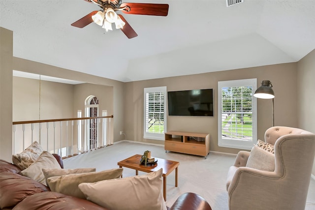 1805 Twin Oaks St, Friendswood, TX 77546 - living room with lofted ceiling, light carpet, a ceiling fan, and baseboards