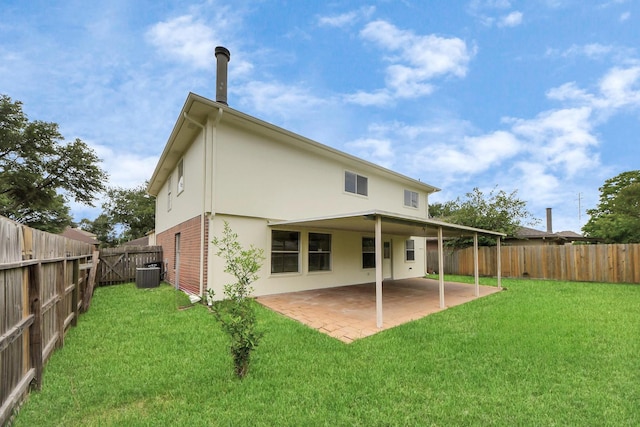 4310 Lucas Trace Ct, Houston, TX 77066 - back of house featuring central AC unit, a patio area, stucco siding, and brick siding