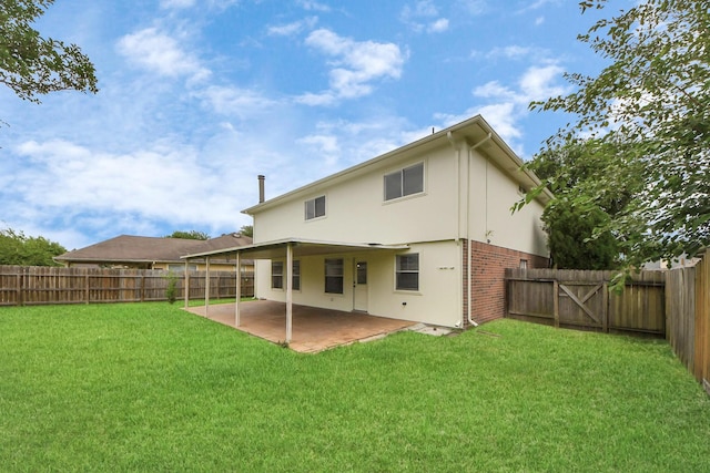 4310 Lucas Trace Ct, Houston, TX 77066 - back of property featuring a patio area, brick siding, stucco siding, and a gate