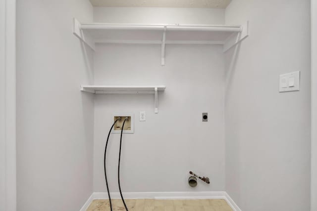 4310 Lucas Trace Ct, Houston, TX 77066 - laundry room featuring washer hookup, baseboards, and electric dryer hookup