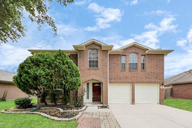 4310 Lucas Trace Ct, Houston, TX 77066 - view of front of home with concrete driveway, brick siding, and a garage