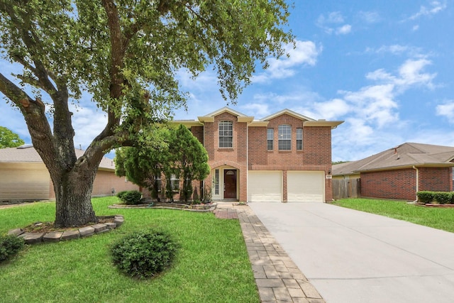 4310 Lucas Trace Ct, Houston, TX 77066 - traditional home featuring concrete driveway, a garage, and brick siding