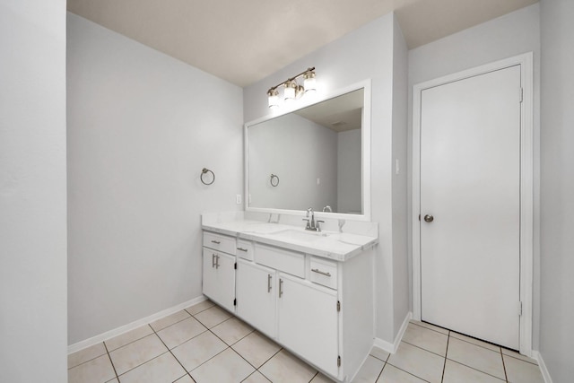 4310 Lucas Trace Ct, Houston, TX 77066 - bathroom featuring vanity, tile patterned flooring, and baseboards