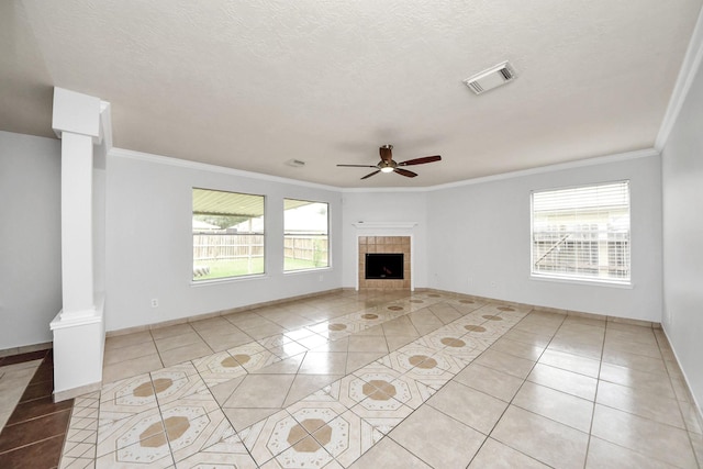 4310 Lucas Trace Ct, Houston, TX 77066 - unfurnished living room featuring light tile patterned floors, decorative columns, crown molding, a ceiling fan, and baseboards