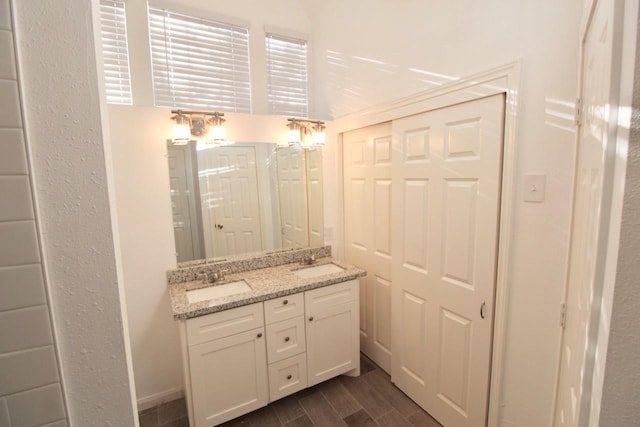5326 Village Springs Dr, Houston, TX 77339 - bathroom with double vanity and wood finished floors