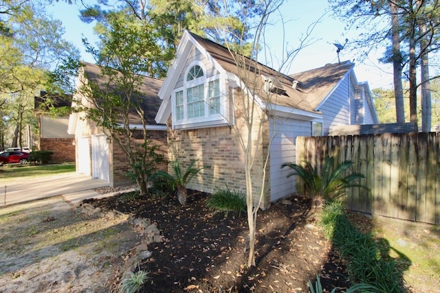 5326 Village Springs Dr, Houston, TX 77339 - view of home's exterior featuring brick siding