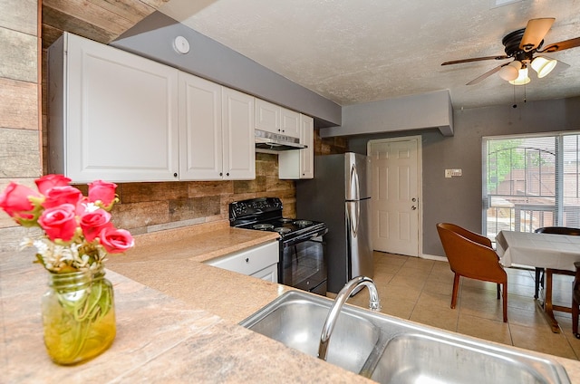 7373 Cook Rd, Houston, TX 77072 - kitchen featuring black range with electric cooktop, under cabinet range hood, a sink, light countertops, and decorative backsplash