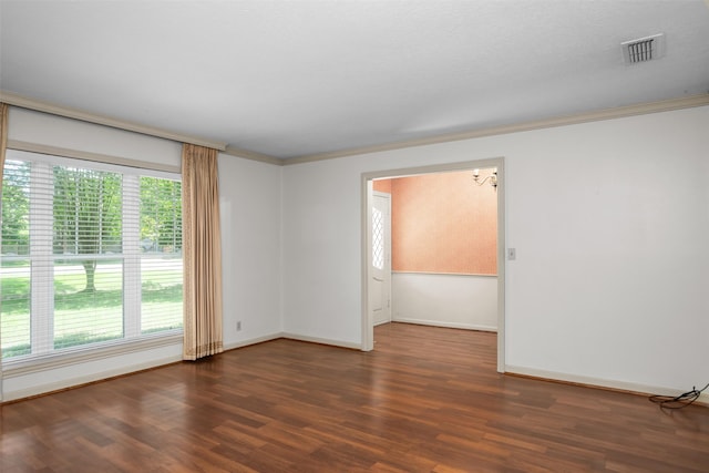 103 N Gordon Dr, Crockett, TX 75835 - empty room with wood finished floors, ornamental molding, and baseboards