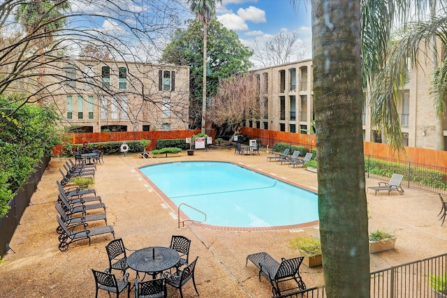 4631 Wild Indigo St Unit 575, Houston, TX 77027 - community pool with a patio