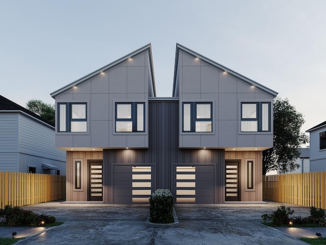 4433 Phlox St, Houston, TX 77051 - modern home featuring driveway, an attached garage, and board and batten siding