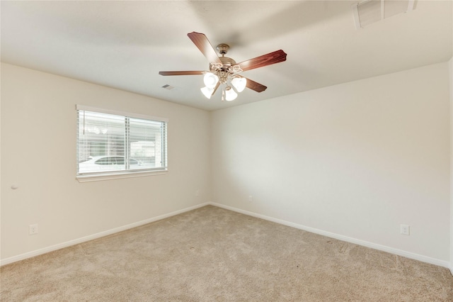 6751 Arlington Dr, Manvel, TX 77578 - unfurnished room featuring light colored carpet, baseboards, and ceiling fan