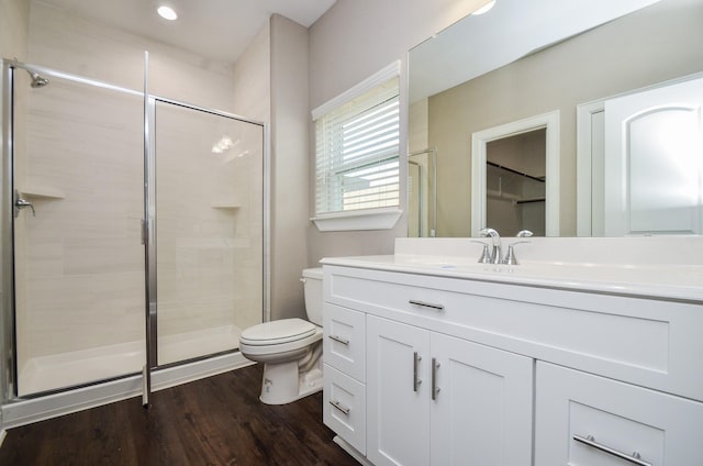 4215 Sterling St, Houston, TX 77051 - full bathroom featuring toilet, a shower stall, vanity, and wood finished floors