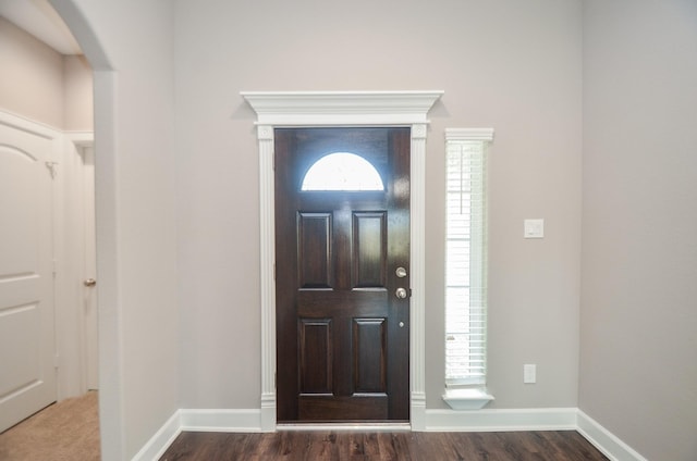 4215 Sterling St, Houston, TX 77051 - entrance foyer featuring wood finished floors, arched walkways, and baseboards