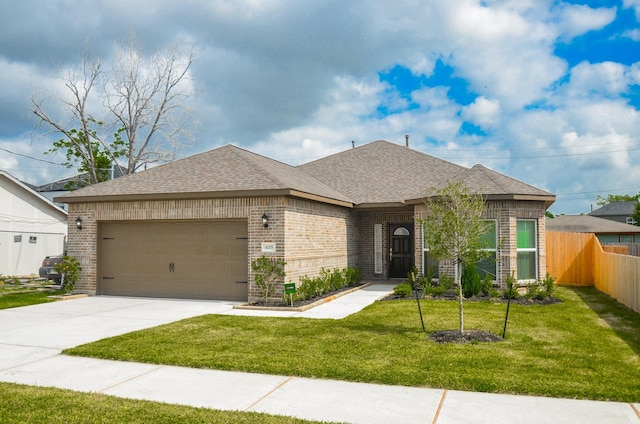 4215 Sterling St, Houston, TX 77051 - view of front of home featuring brick siding, an attached garage, a shingled roof, and driveway