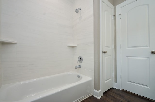 4215 Sterling St, Houston, TX 77051 - full bath featuring wood finished floors,  shower combination, and baseboards