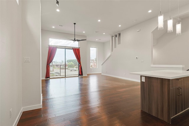 2317 Cleburne St, Houston, TX 77004 - unfurnished living room with recessed lighting, baseboards, dark wood-style floors, and ceiling fan