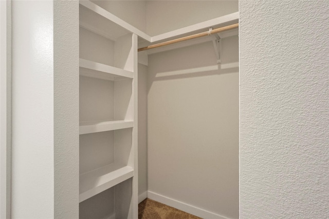 2317 Cleburne St, Houston, TX 77004 - spacious closet featuring dark colored carpet