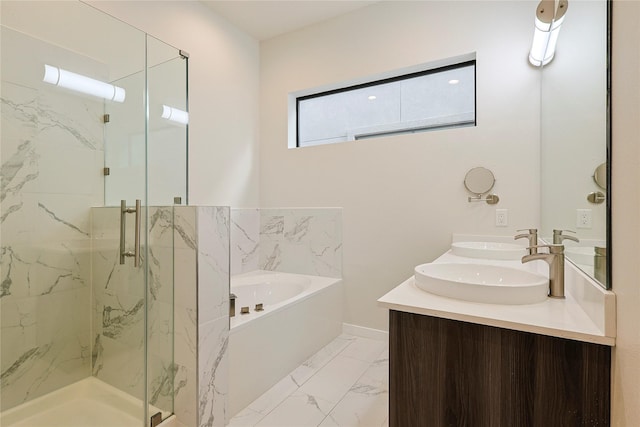 2317 Cleburne St, Houston, TX 77004 - bathroom with a bath, marble finish flooring, a marble finish shower, double vanity, and baseboards