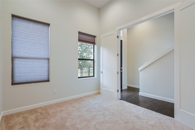 2317 Cleburne St, Houston, TX 77004 - unfurnished bedroom with dark colored carpet and baseboards