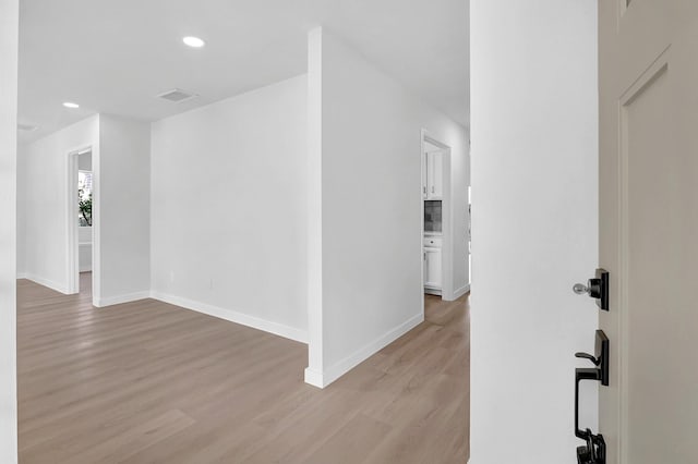 3246 Windmoor Dr, Katy, TX 77449 - empty room featuring light wood-style floors, baseboards, and recessed lighting