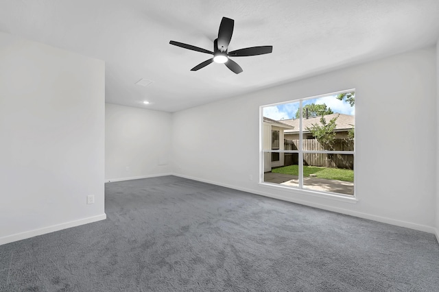 3246 Windmoor Dr, Katy, TX 77449 - empty room featuring carpet, baseboards, and a ceiling fan
