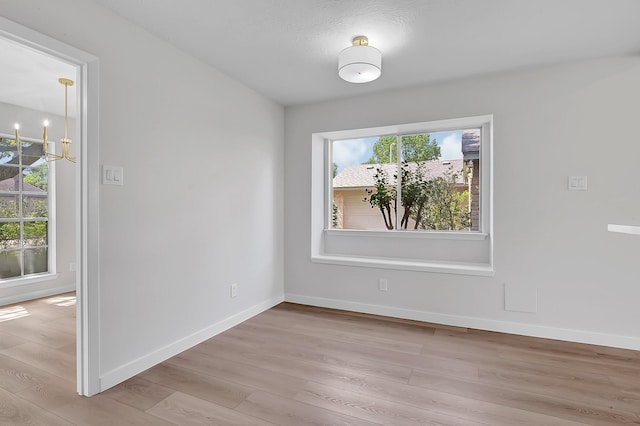 3246 Windmoor Dr, Katy, TX 77449 - empty room featuring wood finished floors and baseboards