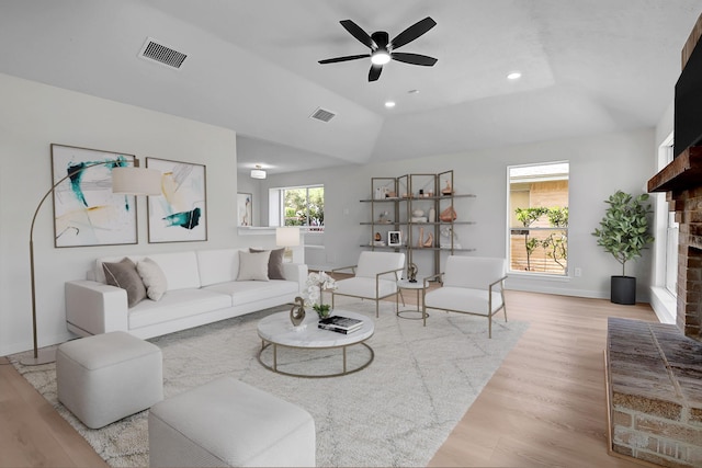 3246 Windmoor Dr, Katy, TX 77449 - living area featuring a fireplace, wood finished floors, ceiling fan, baseboards, and recessed lighting