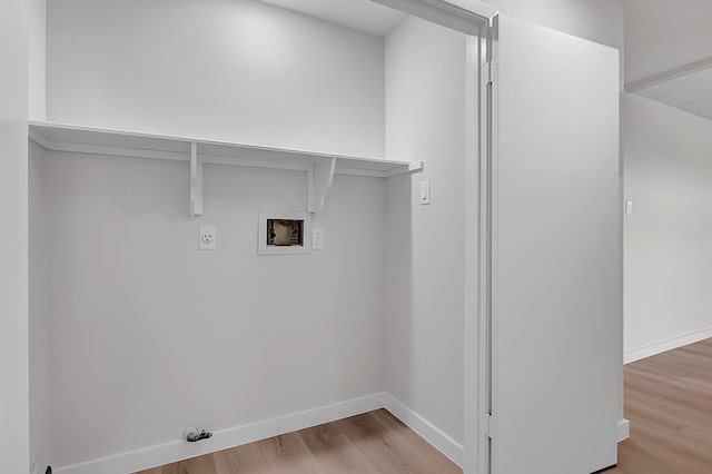 3246 Windmoor Dr, Katy, TX 77449 - laundry room with hookup for an electric dryer, hookup for a washing machine, light wood finished floors, and baseboards