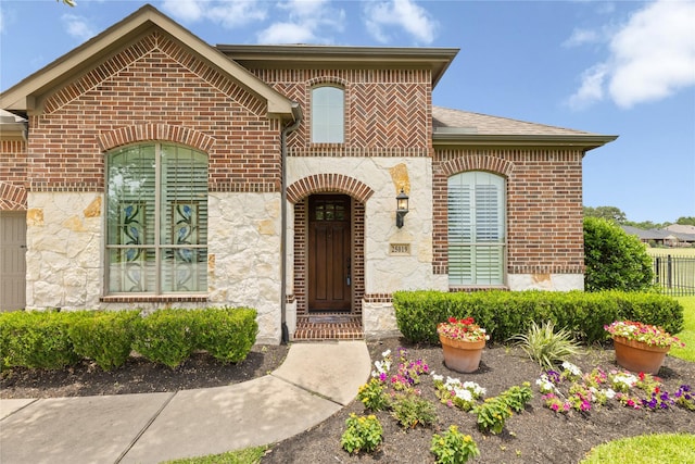 25019 Bahme Springs Ln, Porter, TX 77365 - entrance to property featuring brick siding and stone siding